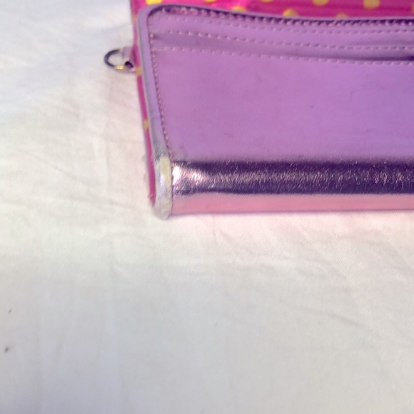 HELLO KITTY metallic pink wallet. Holds up to 16 cards. Polka dot lining inside. - Picture 13 of 16